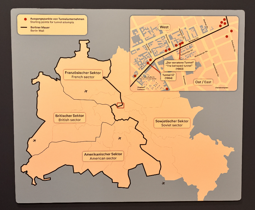 Historical map of divided Berlin showing occupation sectors, the Berlin Wall, and escape tunnels